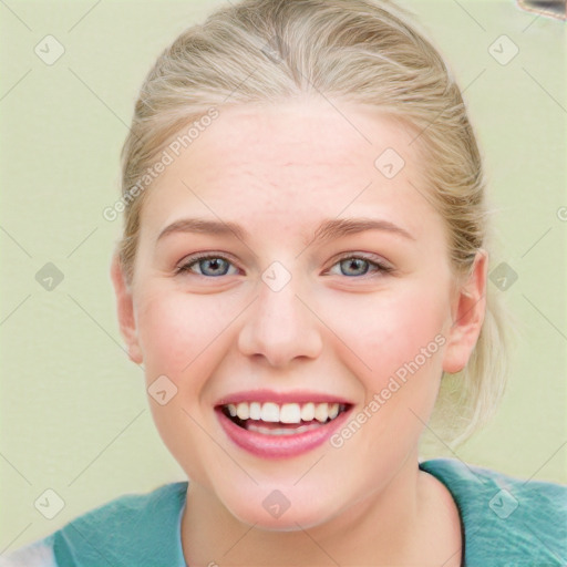 Joyful white young-adult female with medium  brown hair and blue eyes