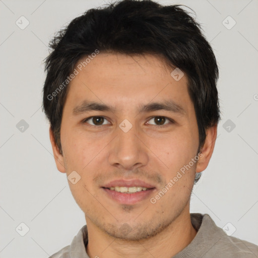 Joyful asian young-adult male with short  brown hair and brown eyes