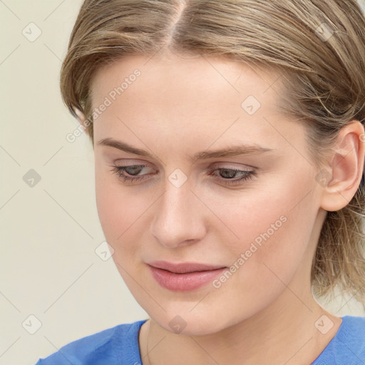 Joyful white young-adult female with medium  brown hair and blue eyes