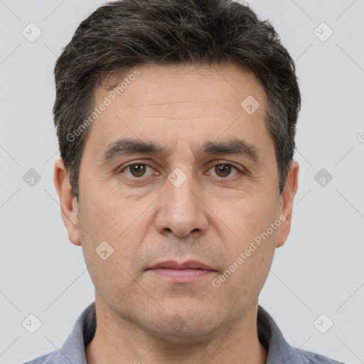 Neutral white adult male with short  brown hair and brown eyes