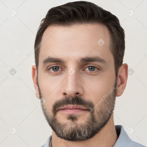 Neutral white young-adult male with short  brown hair and brown eyes