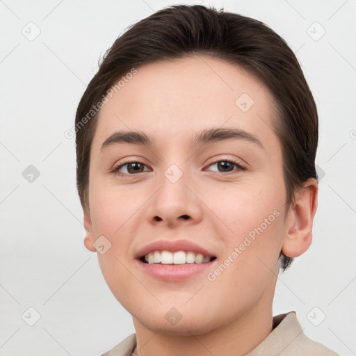 Joyful white young-adult female with short  brown hair and brown eyes