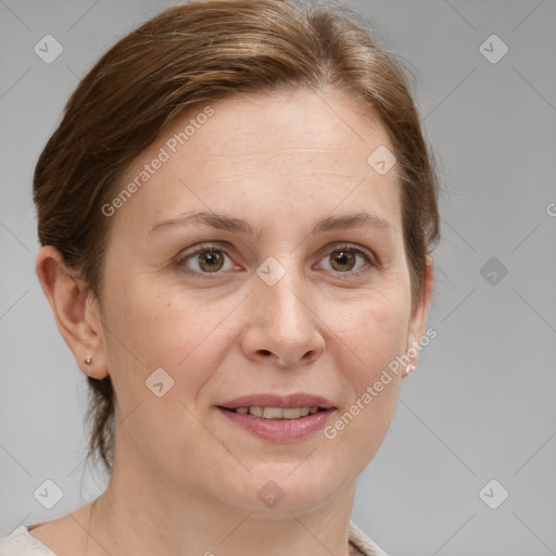 Joyful white adult female with medium  brown hair and grey eyes