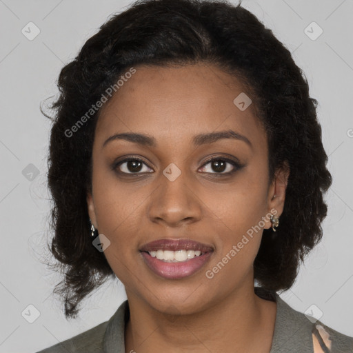 Joyful black young-adult female with long  brown hair and brown eyes