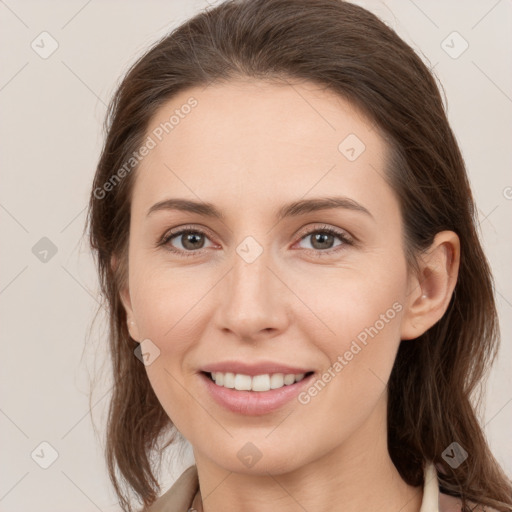 Joyful white young-adult female with medium  brown hair and brown eyes