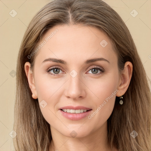 Joyful white young-adult female with long  brown hair and grey eyes