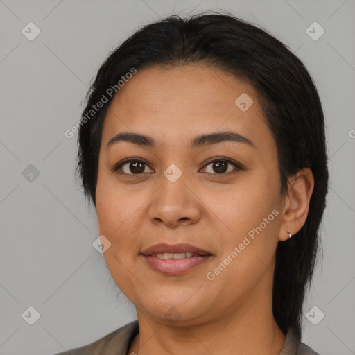 Joyful latino young-adult female with medium  brown hair and brown eyes