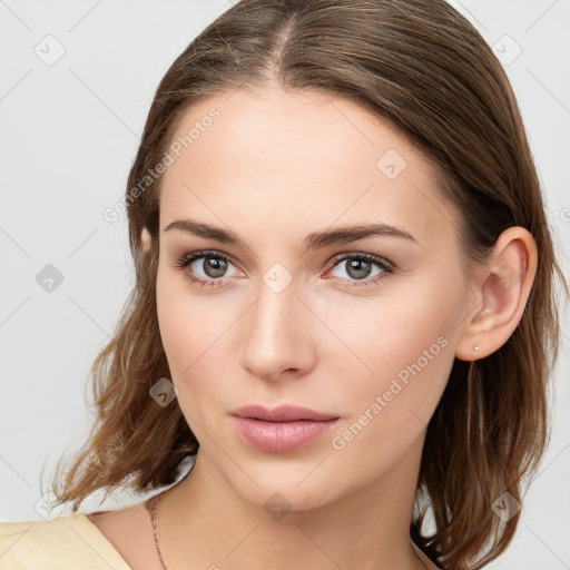 Neutral white young-adult female with medium  brown hair and brown eyes