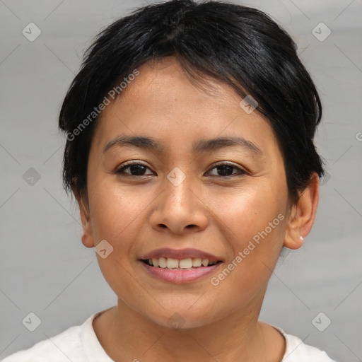 Joyful asian young-adult female with medium  brown hair and brown eyes