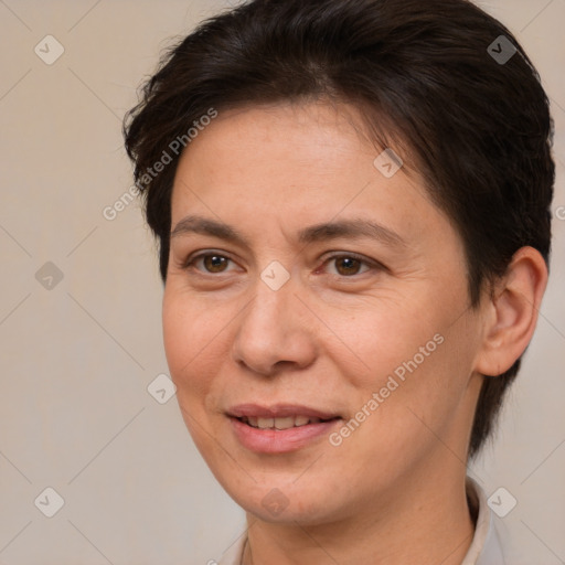 Joyful white adult female with medium  brown hair and brown eyes