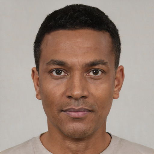 Neutral black young-adult male with short  black hair and brown eyes