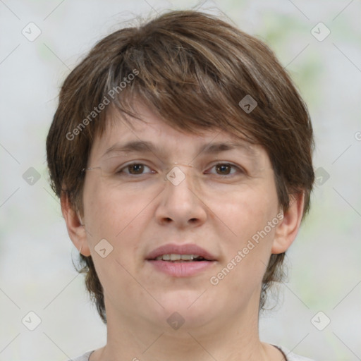 Joyful white adult female with medium  brown hair and grey eyes