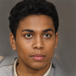 Neutral black young-adult male with short  brown hair and brown eyes