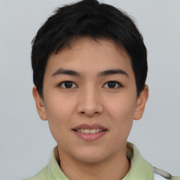 Joyful asian young-adult female with short  black hair and brown eyes