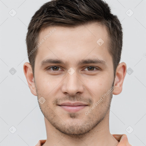 Joyful white young-adult male with short  brown hair and brown eyes