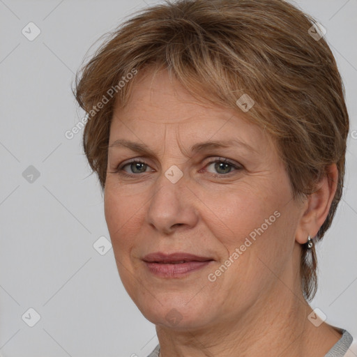 Joyful white adult female with medium  brown hair and brown eyes