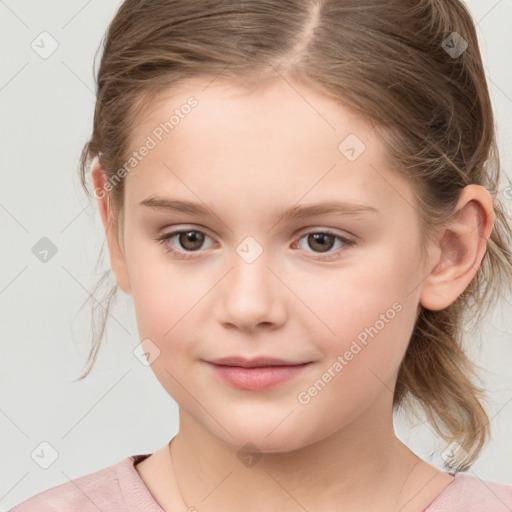 Joyful white child female with medium  brown hair and grey eyes