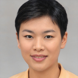 Joyful asian young-adult female with short  black hair and brown eyes