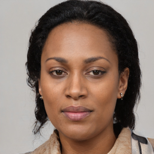 Neutral black young-adult female with long  black hair and brown eyes