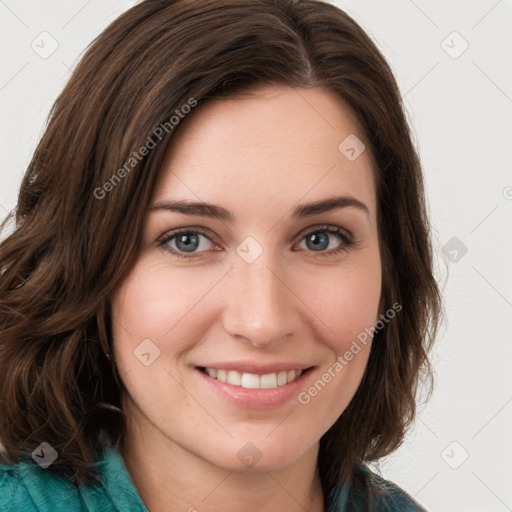 Joyful white young-adult female with long  brown hair and green eyes