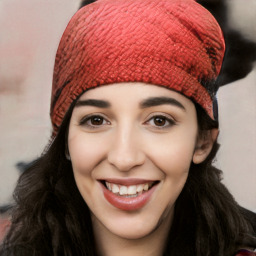 Joyful white young-adult female with long  black hair and brown eyes