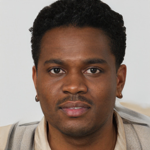 Neutral black young-adult male with short  brown hair and brown eyes