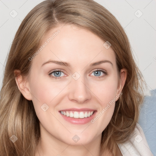 Joyful white young-adult female with medium  brown hair and blue eyes