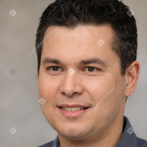 Joyful white adult male with short  brown hair and brown eyes