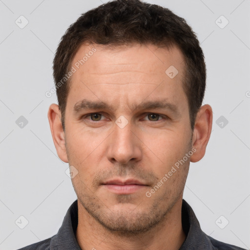 Neutral white young-adult male with short  brown hair and brown eyes