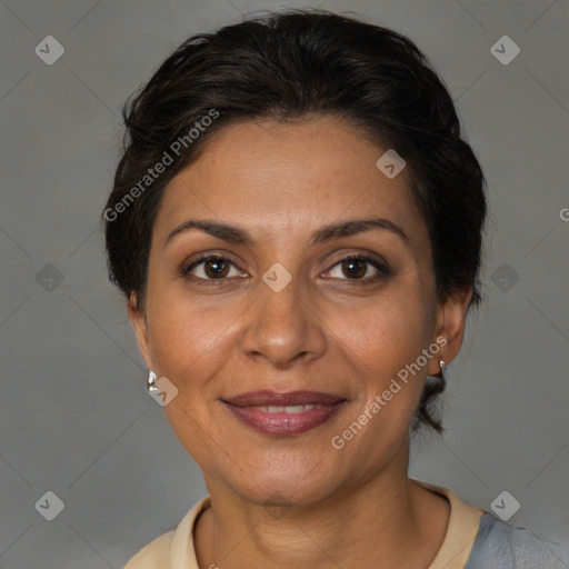 Joyful white adult female with short  brown hair and brown eyes