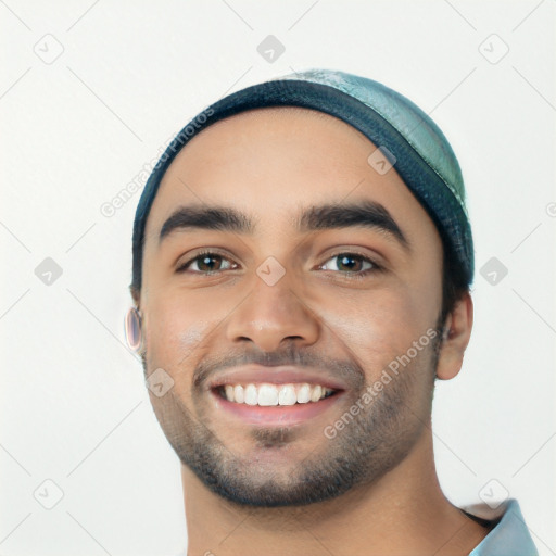 Joyful white young-adult male with short  black hair and brown eyes