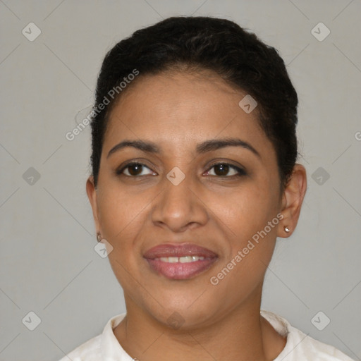 Joyful latino young-adult female with short  brown hair and brown eyes