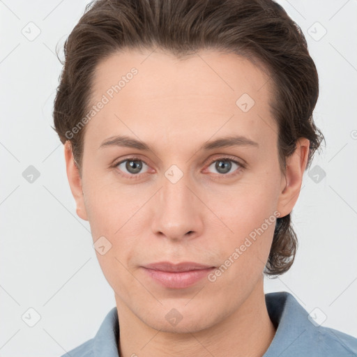 Joyful white young-adult female with short  brown hair and grey eyes