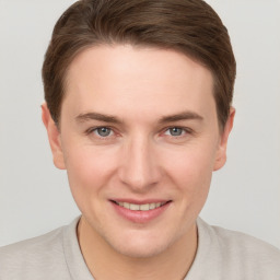 Joyful white young-adult female with short  brown hair and grey eyes