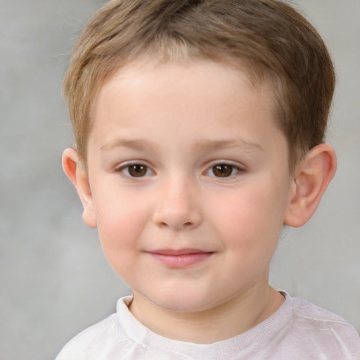 Joyful white child male with short  brown hair and brown eyes