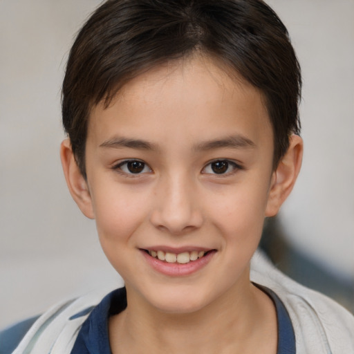 Joyful white child female with short  brown hair and brown eyes