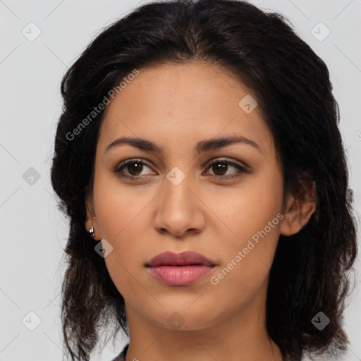 Joyful latino young-adult female with medium  brown hair and brown eyes