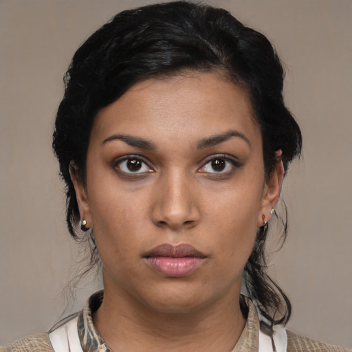 Neutral latino young-adult female with medium  brown hair and brown eyes