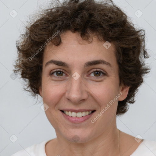 Joyful white adult female with short  brown hair and brown eyes