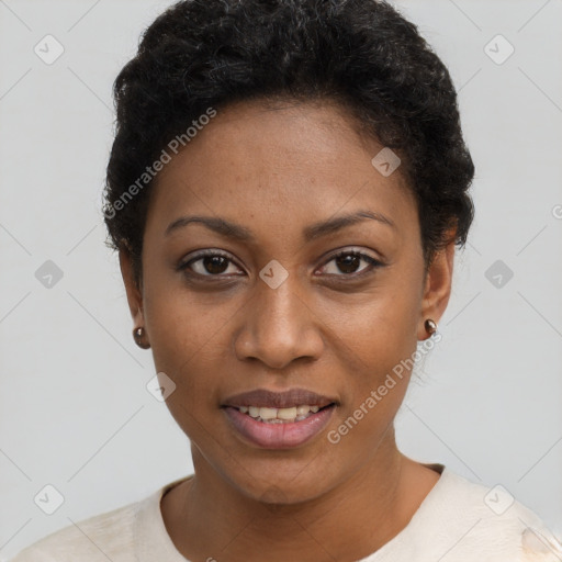 Joyful black young-adult female with short  black hair and brown eyes