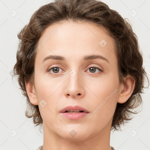 Neutral white young-adult female with short  brown hair and brown eyes