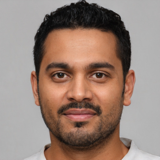 Neutral latino young-adult male with short  black hair and brown eyes