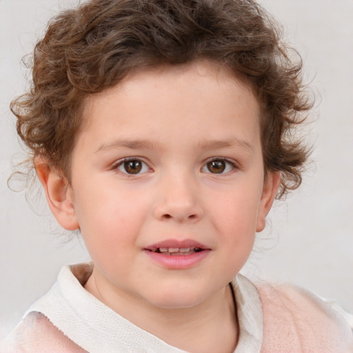 Joyful white child male with short  brown hair and brown eyes