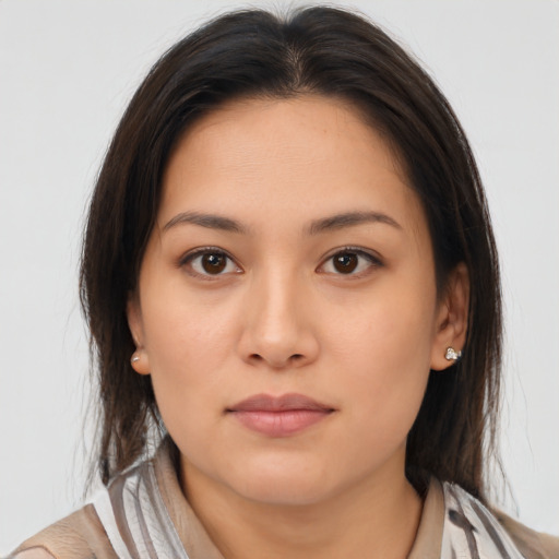 Neutral asian young-adult female with medium  brown hair and brown eyes