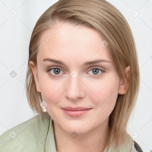 Joyful white young-adult female with medium  brown hair and blue eyes