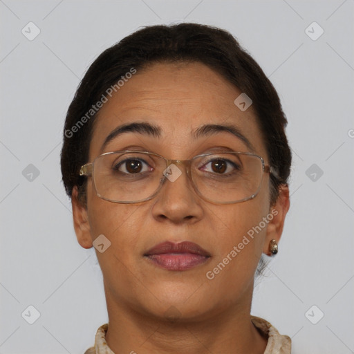Joyful black adult female with short  brown hair and brown eyes