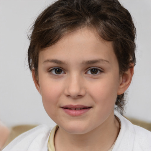 Joyful white child female with medium  brown hair and brown eyes