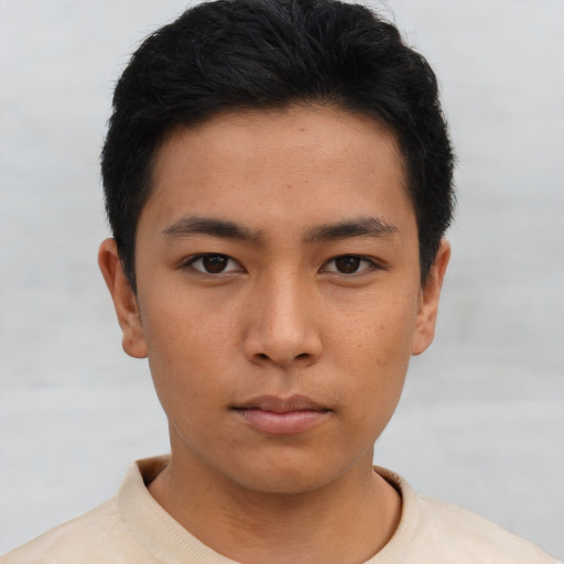 Neutral asian young-adult male with short  black hair and brown eyes