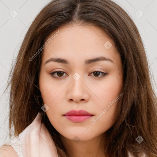 Neutral white young-adult female with long  brown hair and brown eyes