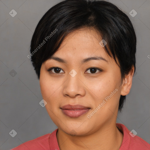 Joyful asian young-adult female with medium  black hair and brown eyes